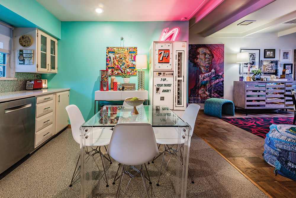 In the kitchen, a vintage 7-Up vending machine now serves as a beer cooler. The floor, formerly white tile, has been laid with Marmoleum, a period-appropriate and sustainable flooring material often used in public spaces such as New York City subway cars.