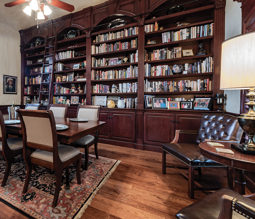 (Above) The Pryors’ formal dining room could easily double as a library. Both are avid readers and share a natural curiosity and love of the written word. The home’s previous owner, Tom Bevel, used the room as a boardroom for his business, which operated from the home. Bevel is one of the foremost blood-spatter experts in the nation, and he built a “splatter lab” in the home’s studio apartment, one which is now simply extra room for guests.