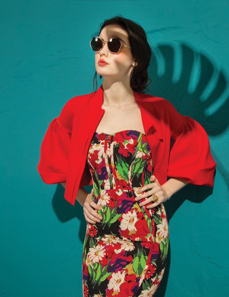 Veronica Beard Saffron dress in black multi and Nach cheetah ring from Gretta Sloane; Marie Saint Pierre Jacket in ruby from Balliets; Vixen earrings from Siempre Viva; Mykita Decades Alessia sunglasses from TSO Optical