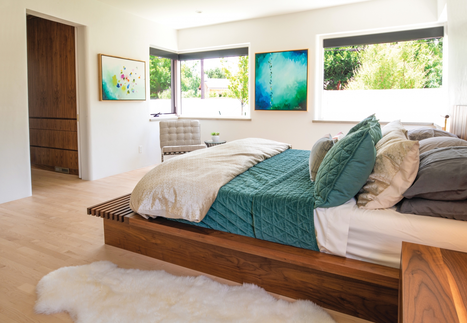 The master bedroom, with its custom furnishings, could easily be mistaken for a sumptuous suite at a four-star resort. In fact, given the choice, Kyle and Kate would rather be home than almost anywhere else.