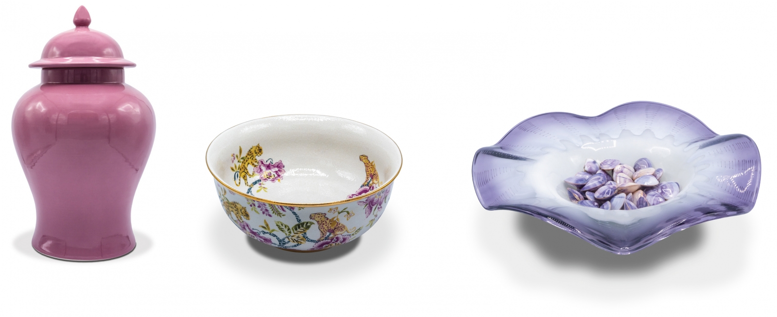 From The Wood Garden: Lidded temple jar, $150; Braganza jewel basin, $360; Purple and white glass art bowl, $135, with violet clam shells, $2.50 each