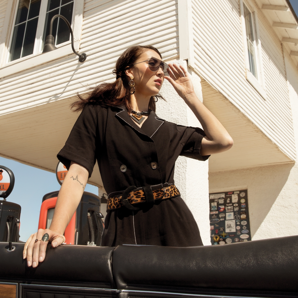 Moon River black jumpsuit, Pilgrim sunglasses, Shelly Dahari necklace, Soko brass and horn earrings, Soko channel ring and Seaworthy tiger’s eye indigo ring from Rosegold; vintage leopard belt from Library