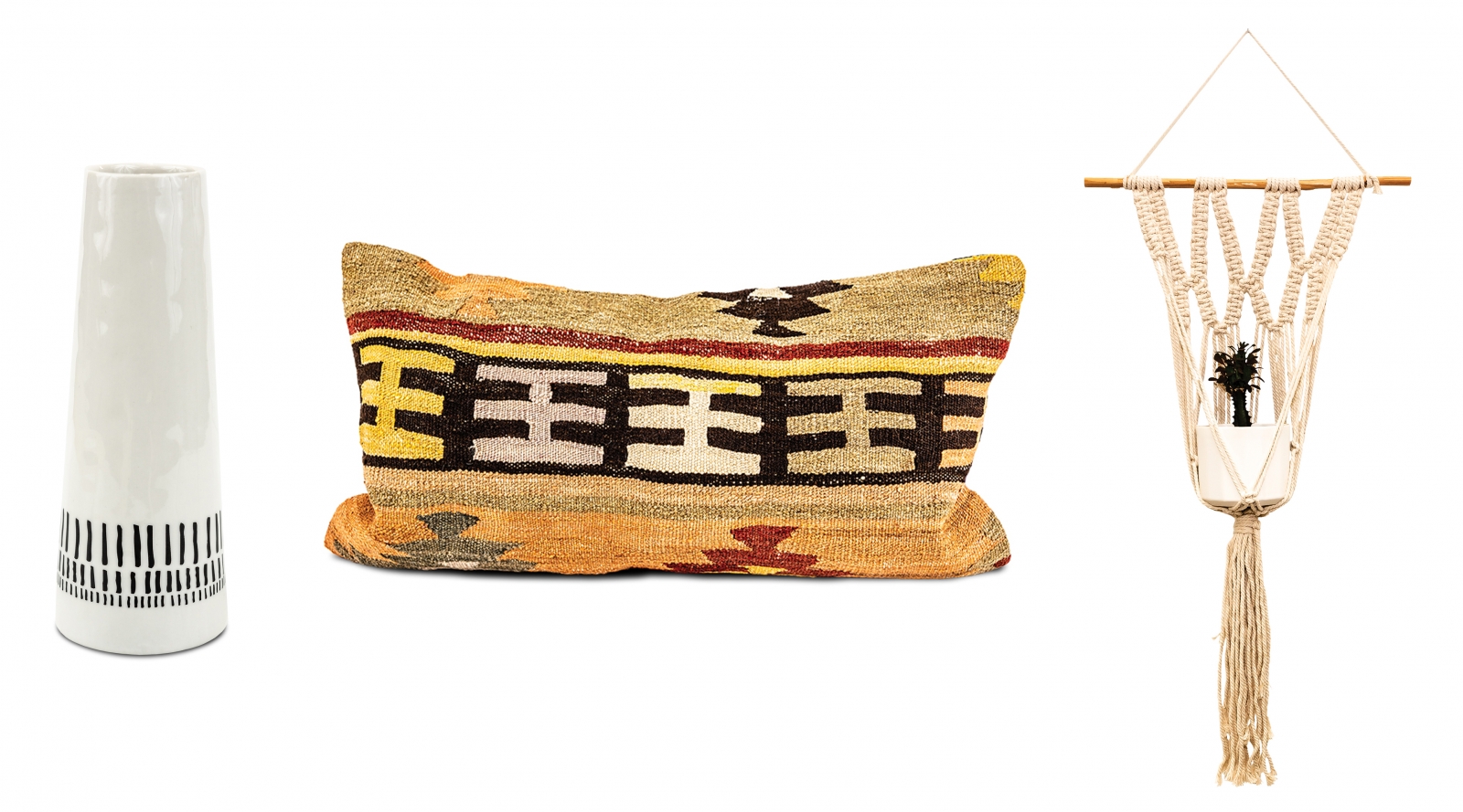 Sabaa black and white ceramic vase, $18.95 “Because a black and white piece goes with everything.”; Vintage Kilim pillows, $49 “Every one is handmade, unique and versatile.”; 32” macrame plant hanger, $27; riveted planter, $36; 4” cactus, $12.99 “Handmade macrame adds style, and when paired with a plant, you get a natural element to the space.”