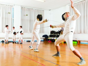 Young Fencers Training With Coach