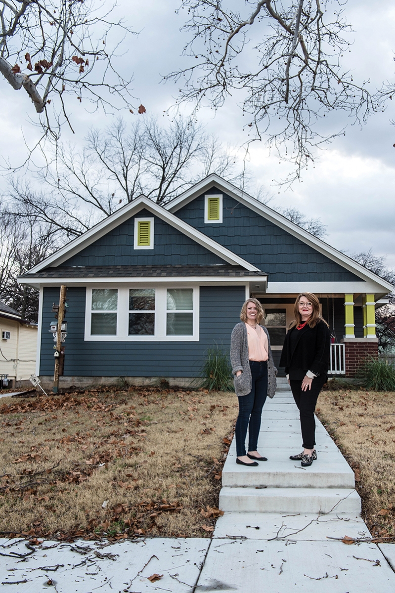 Resident Valerie Wiegman in front of her home with Positively Paseo’s Nelia Crank-Clements