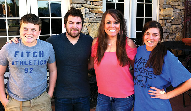 Chelsea Meilke (pink shirt) with children Chaden, Ty and Tori