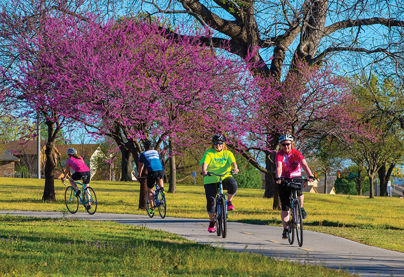 Trails around Lake Overholser give cyclists beautiful scenery.