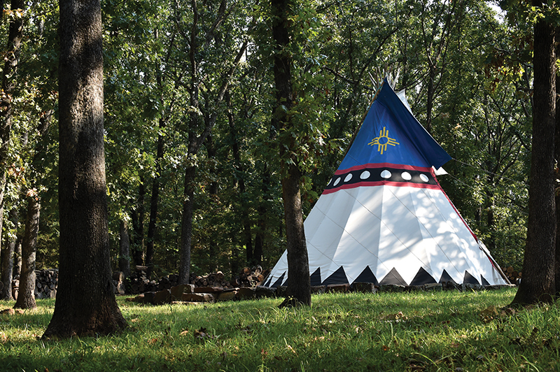 A teepee nestled in the woods is used for meditation, Reiki, massage therapy and yoga.