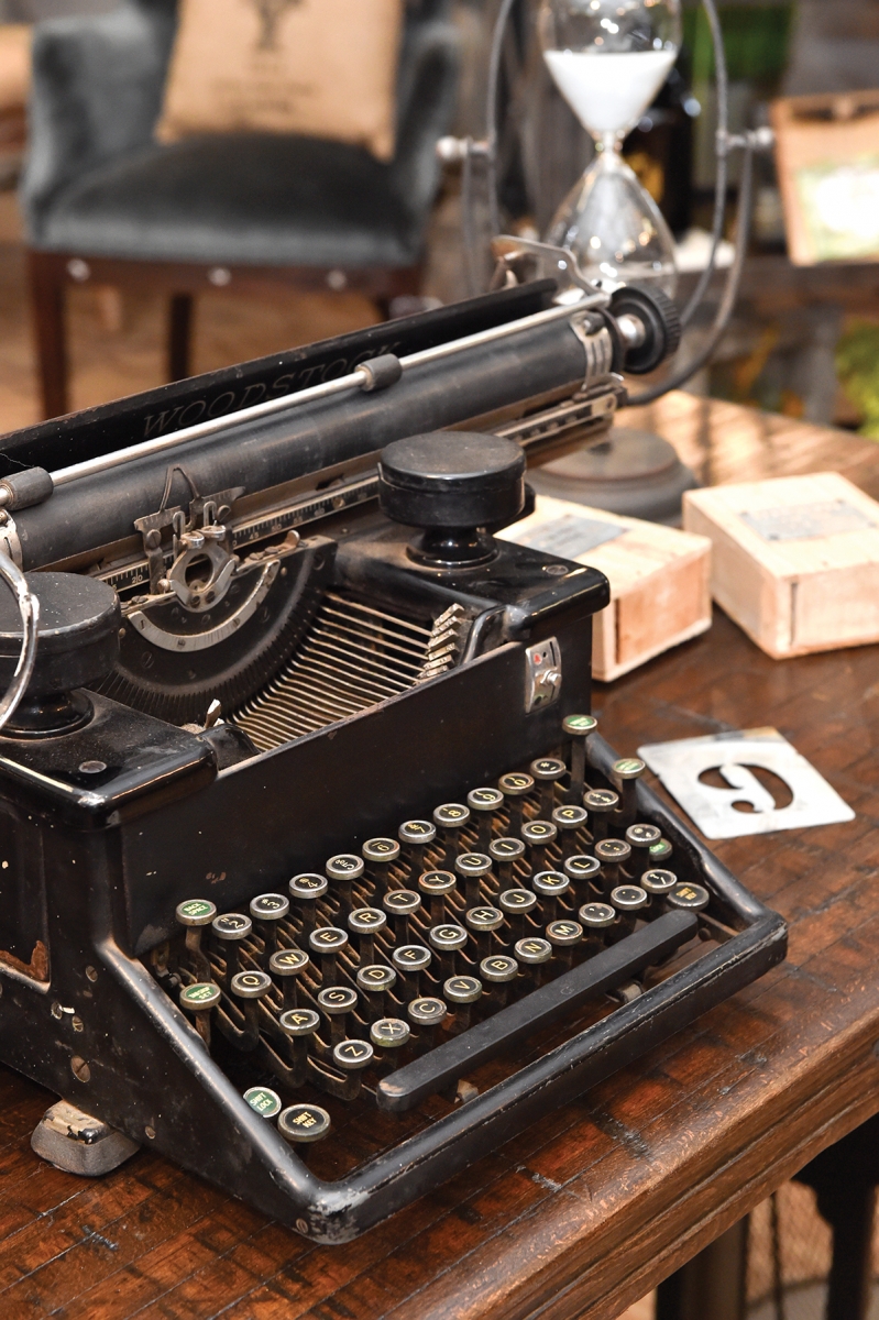 A vintage typewriter reposes at Urban Farmhouse Designs.