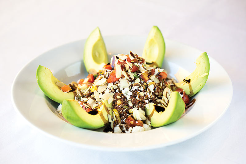 A garlic vinaigrette laces extra flavor through the corn, goat cheese, pico de gallo and namesake ingredients in the quinoa avocado salad from Cheever’s.