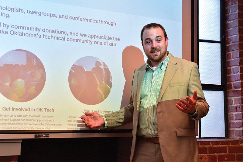 Lucas Watson talks with a Techlahoma Meet Up group of coders at The 404.