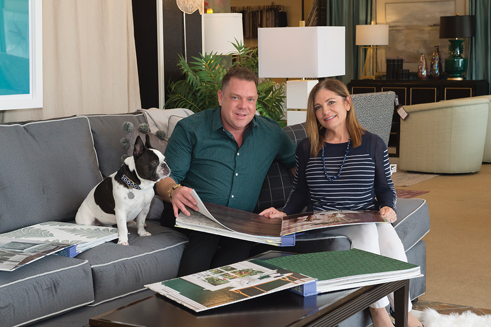 Ryan Johnson and Cindy Curley, co-owners of Norwalk Furniture in the Shoppes at Northpark, and his French Bulldog Beauregard