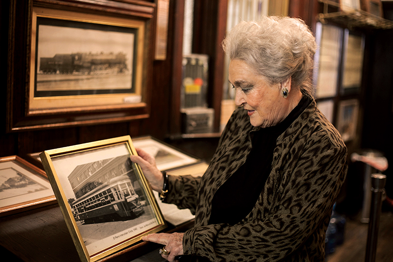 Canadian County Historical Museum curator Pat Reuter with a circa 1940 photo of the interurban trolley