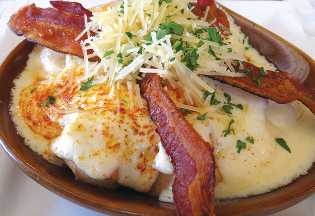 The Hot Brown, a yummy open-faced creation that originated at the Brown Hotel