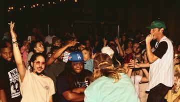 Rapper Josh Sallee performs in front of a packed, vibrant crowd at a MAFF party in Oklahoma City.