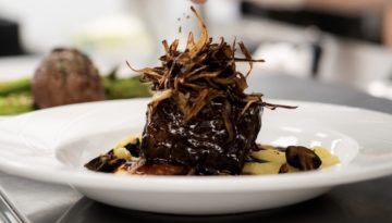 The short rib dish from the Joinery features a goat cheese ravioli and bone marrow bordelaise.