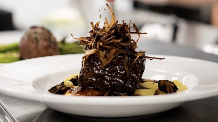 The short rib dish from the Joinery features a goat cheese ravioli and bone marrow bordelaise.