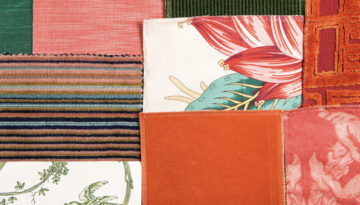 An assortment of patches feature different patterns, such as pastel lines alternating with black lines, a red floral pattern, and splotches of red-orange and rose pink.