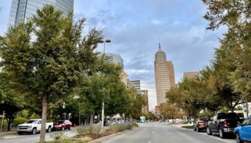 Ron Norick Boulevard in Oklahoma City, which features a median in the middle with trees and bushes.