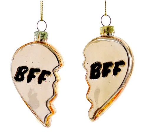 Two ornaments that each make up one half of a heart. They both read "BFF."