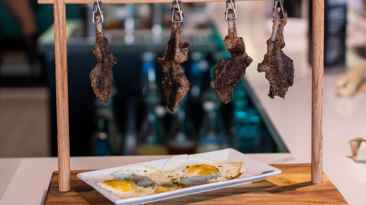 A picture of Scrambl'd's signature lambchops and over-easy eggs in Oklahoma City, OK.