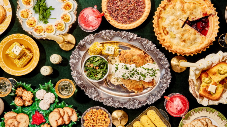 Holiday feast from bird's eye view against a green background