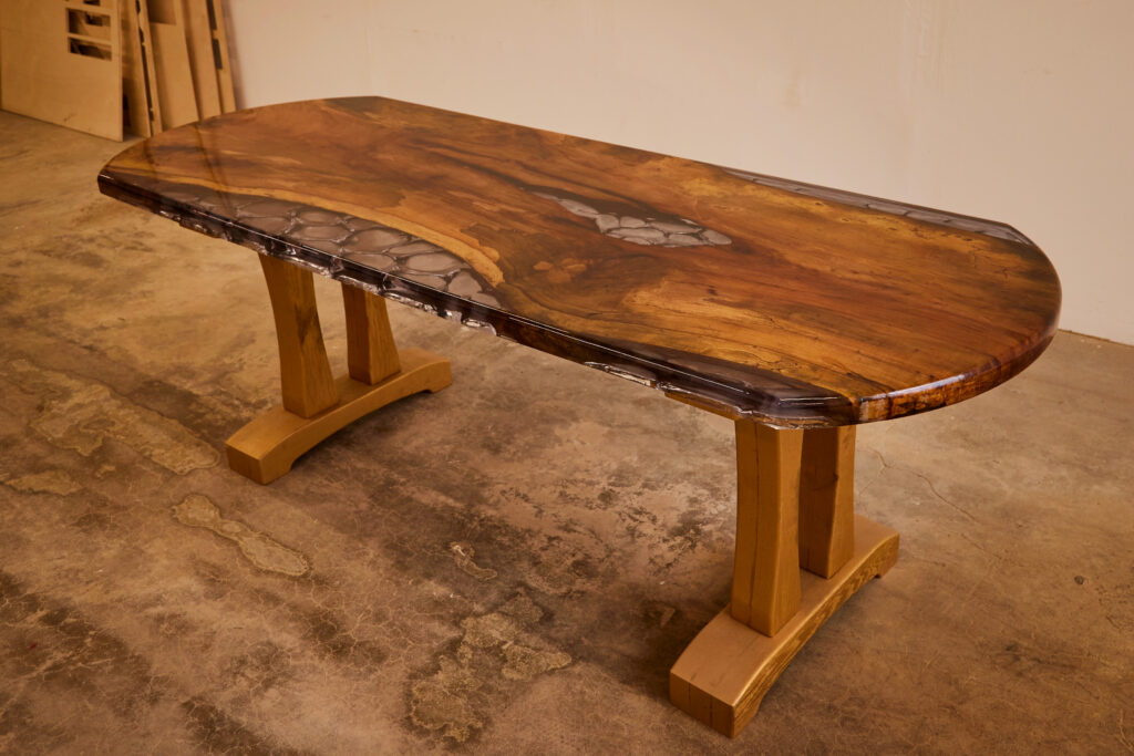 A wooden bench made by Jonny Builds in Oklahoma.