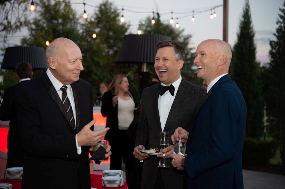 Three men in suits at OPUS XII: Club Cabaret