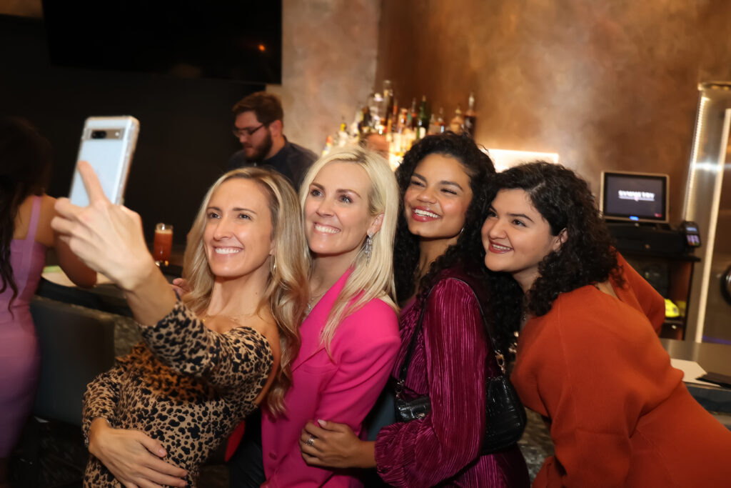 Four HER Honorees pose for a selfie