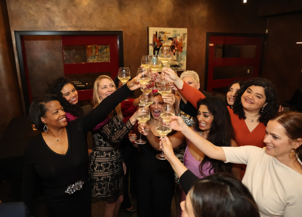 HER honorees toast at the 2023 HER awards