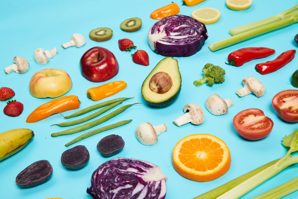 Fresh fruits and vegtables arranged to show healthy living tips for 2024.