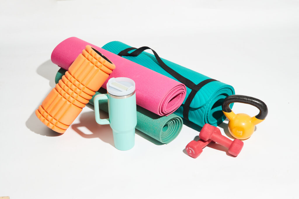 A variety of exercise equipment styled for a photo to show healthy living tips for 2024.