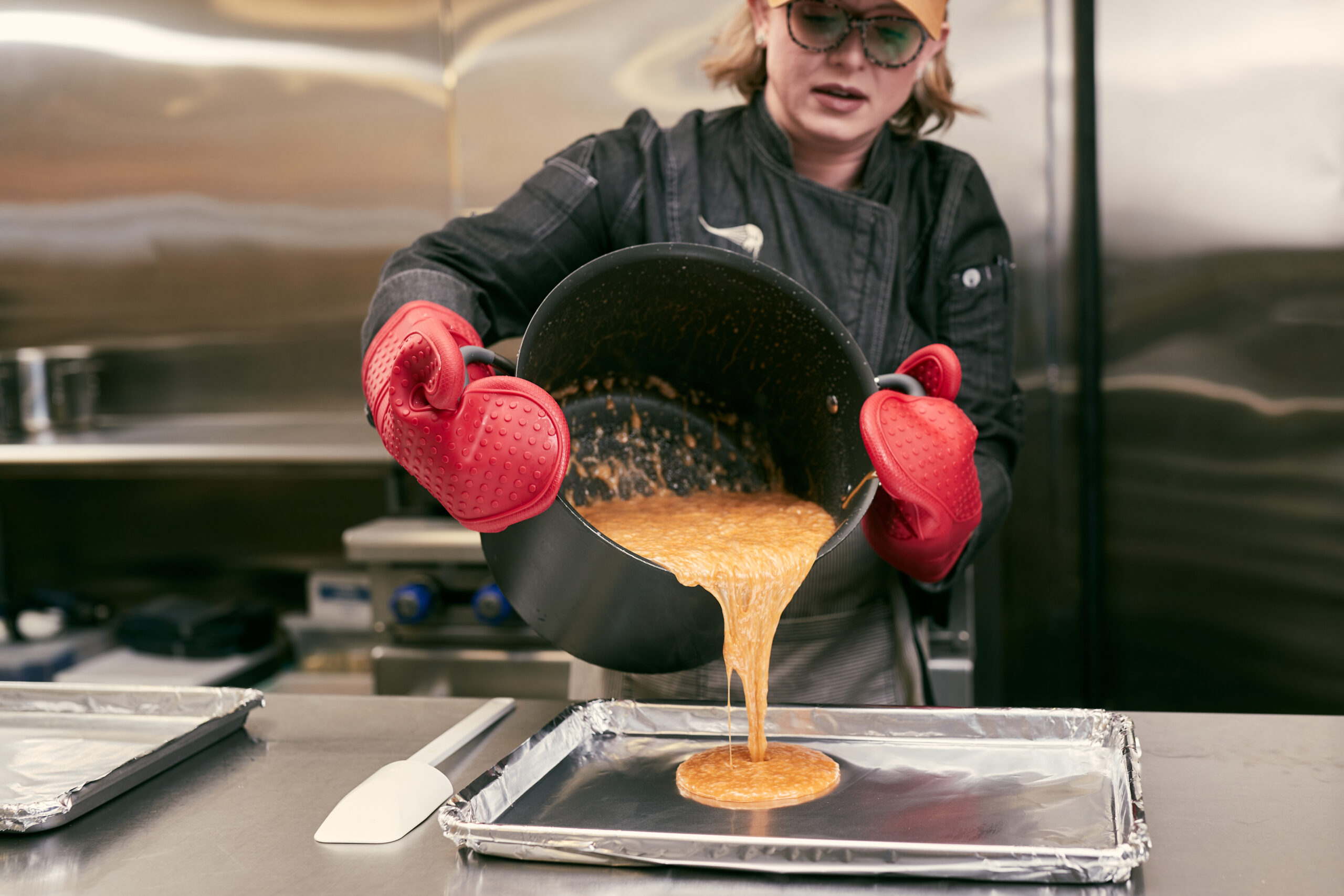 photo of Melissa Wedman of Mollycoddled Hash Slinger making candy