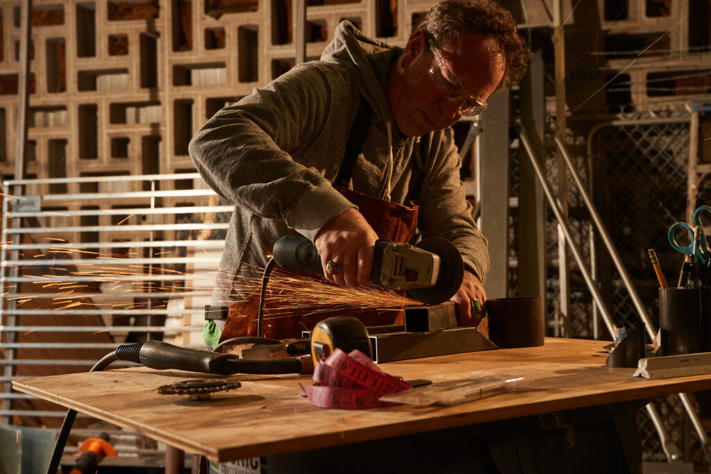 Oklahoma artist Klint Schor working on his latest piece. Photographed by Charlie Neuenschwander.