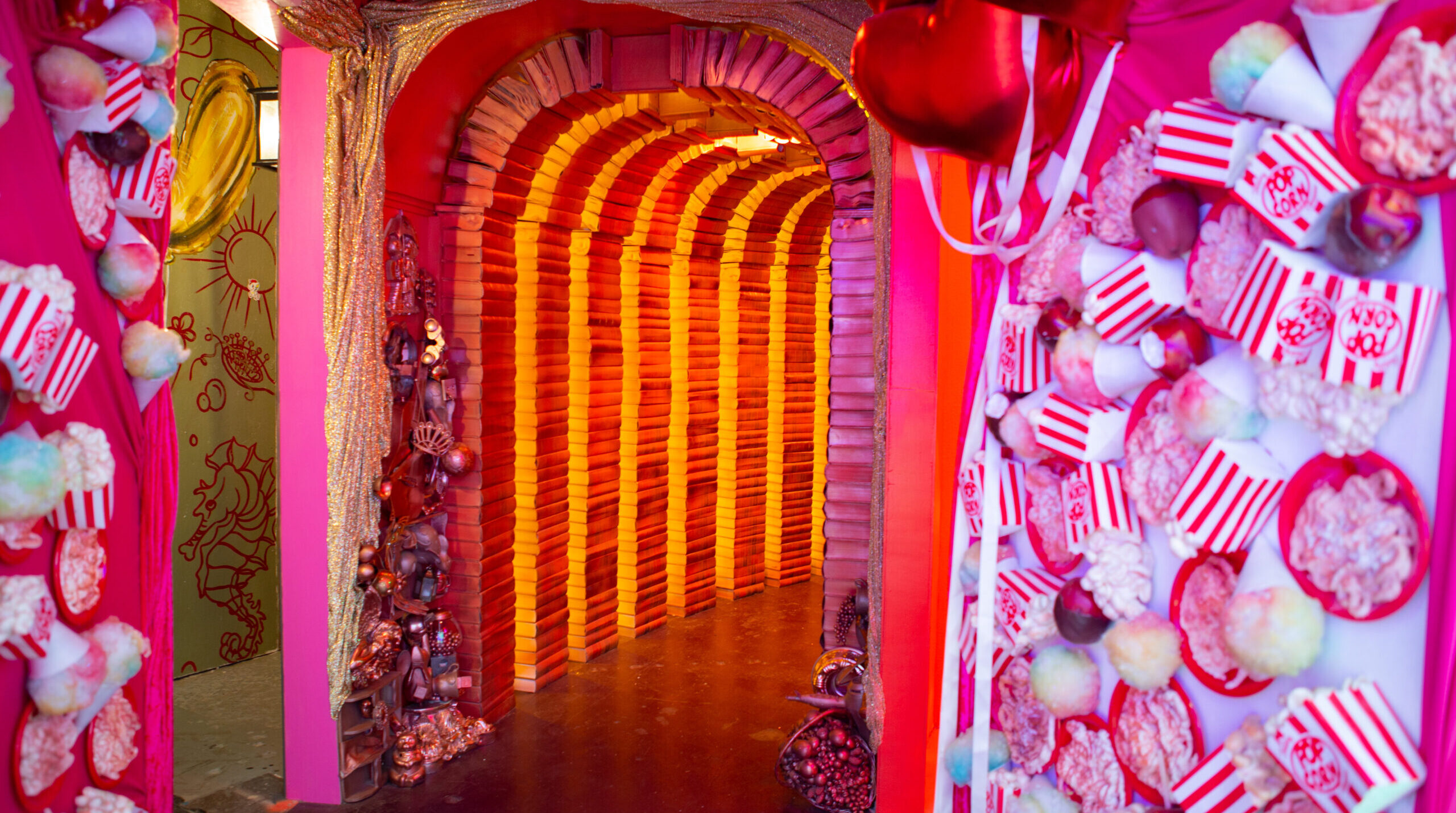 Light up book tunnel at Oklahoma City's Factory Obscura immersive art experience.