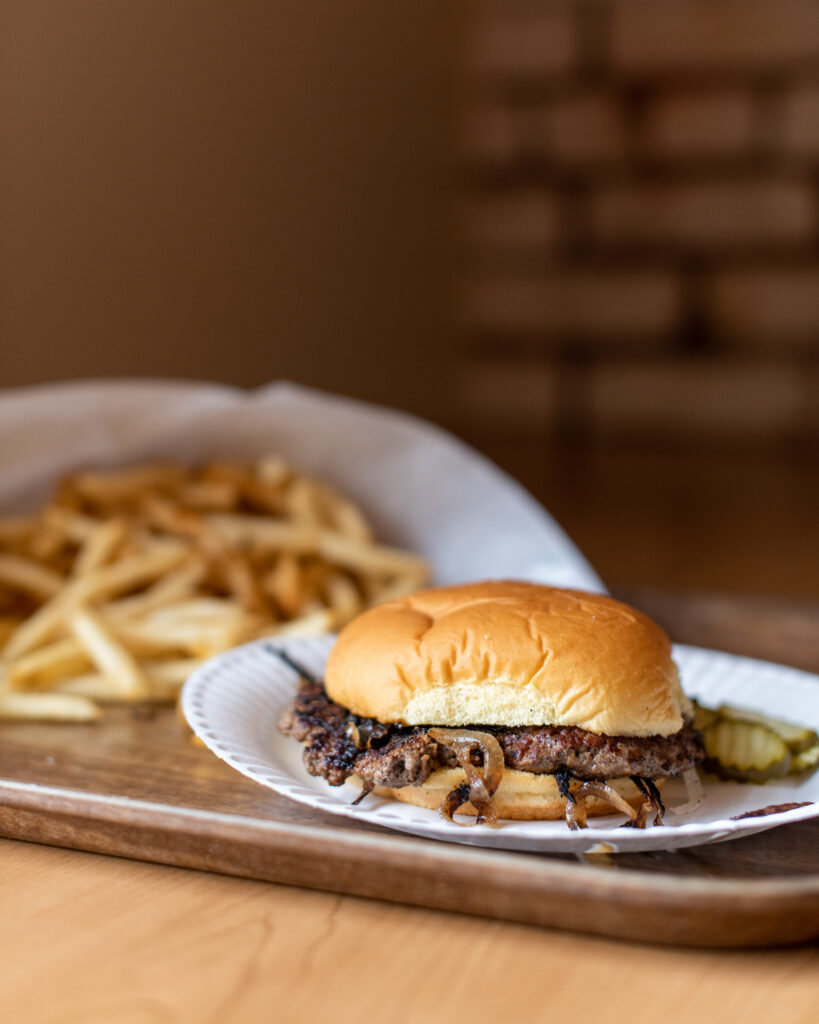 Oklahoma's Onion Burgers. Oklahoma City Film Row District's Sun Cattle Co. Burger and Fries. Photographed by Rachel Maucieri.
