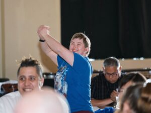 Goodwill Employee of 16 Years Taneka Miller Receiving Honors. Photo by AJ Stegall.